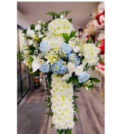 jazmine cross. An arrangement by Geni's Florist and Gifts.