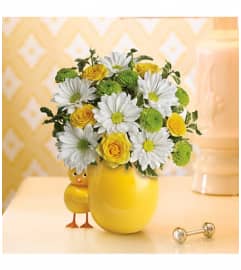 My Sweet Little Chick-a-Dee (Teleflora). An arrangement by North Liberty Flower Shop.