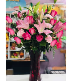 TOPAZ STARS. An arrangement by Geni's Florist and Gifts.