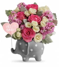 Teleflora's Hello Sweet Baby Girl - Pink. An arrangement by Sueppel's Flowers.