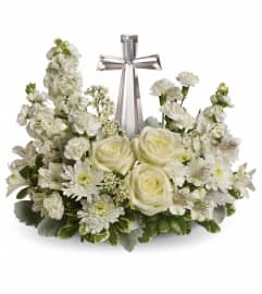 Teleflora's Divine Peace and Grace. An arrangement by Sueppel's Flowers.