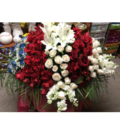 CUSTOM CASKET 2. An arrangement by Creations de Belle.