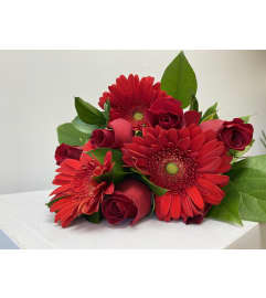 Radient Red Bouquet. An arrangement by Flower Trends Florists.