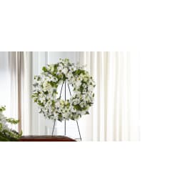 Faithful Wishes Wreath. An arrangement by Brown Floral and Fudge.