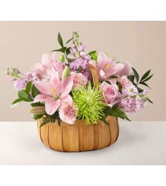 Beautiful Spirit mix Basket. An arrangement by Geni's Florist and Gifts.