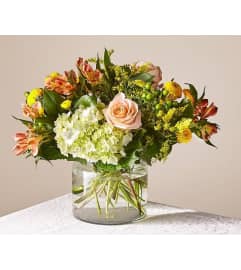 Life's a Peach Bouquet. An arrangement by Geni's Florist and Gifts.