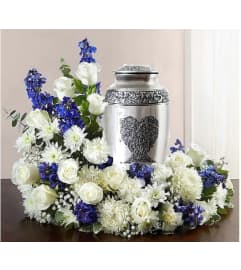 White Ashes Wreath. An arrangement by Geni's Florist and Gifts.