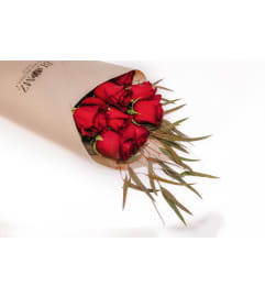 Blumz Wrapped Roses. An arrangement by Blumz Floral Boutique.