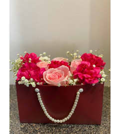 Precious Gifts Bouquet. An arrangement by Sunrise Floral and Gifts.