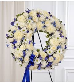 Standing Wreath- Blue and White. An arrangement by Elegant Florist.