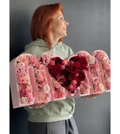 MOM, I love you. An arrangement by Lux Flower Box.
