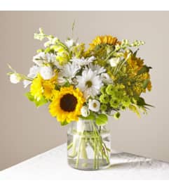 CGY FTD Hello Sunshine. An arrangement by Blossoms On The Trail.