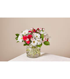 FTD Sweet Surprises. An arrangement by Love Story Florist.