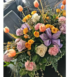 WOW MOM THIS MOTHER'S DAY BOUQUET. An arrangement by A Loving Touch Florist.