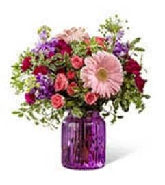 Mason Jar Bouquet. An arrangement by Palmetto Gardens Florist.