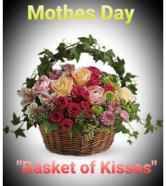 Basket of kisses. An arrangement by Santa Fe Florals and Events.