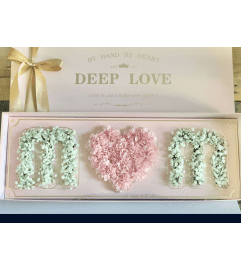 Mom™ Box. An arrangement by Love Story Florist.