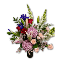 Pink Burst Arrangement. An arrangement by Shalimar Flower Shop.