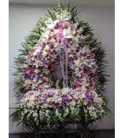 Gate of Heaven Pastel Color. An arrangement by Elegant Florist.