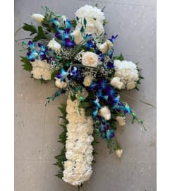 Classic Memorial Cross. An arrangement by Shalimar Flower Shop.