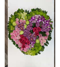 Solid Hearts. An arrangement by Jennifer's Flowers and Gifts.