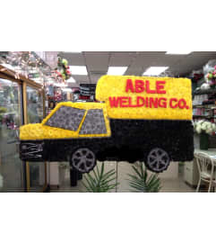 Able Welding Co. An arrangement by Elegant Florist.