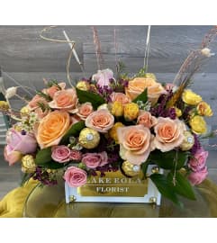 Lake Eola cutie box. An arrangement by Lake Eola Florist.