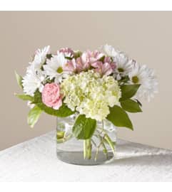 Flutter By Bqt. An arrangement by Petals and Co..