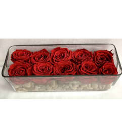 Forever roses in vase. An arrangement by Elegant Florist.