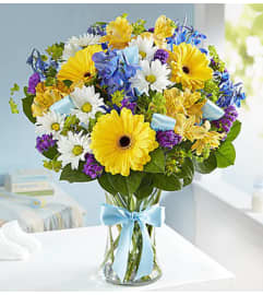 Sweet Baby Boy Floral Arrangement. An arrangement by Elegant Florist.