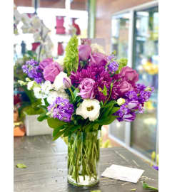 Purple Song Bouquet. An arrangement by Flower World and Gifts.