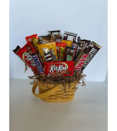 Sweet Tooth Candy Basket. An arrangement by Petals and Co..
