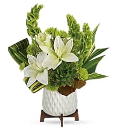 TELEFLORA'S ARTISTIC ANGLES. An arrangement by Triple A Florist.