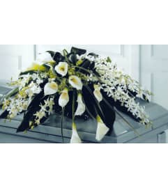 Cala Lily Casket Spray. An arrangement by Flowers by Chris 2.0. Cala Lily Casket Spray. An arrangement by Flowers by Chris 2.0.