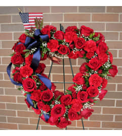 Patriotic Heart Wreath. An arrangement by Flower Stop.