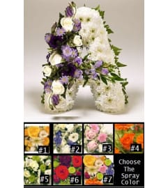 Sympathy Letters. An arrangement by Geni's Florist and Gifts.