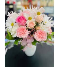 Sweetest than Candy. An arrangement by Geni's Florist and Gifts.