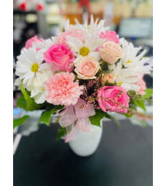 Sweetest than Candy. An arrangement by Geni's Florist and Gifts.