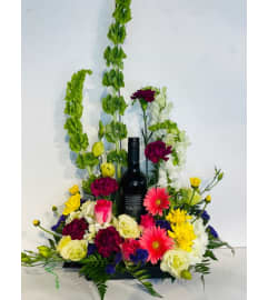 Have a Glass in the Garden!. An arrangement by My Mother's Bloomers.