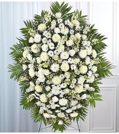 White Simplicity Standing Spray. An arrangement by Brickell Ave Florist. White Simplicity Standing Spray. An arrangement by Brickell Ave Florist.