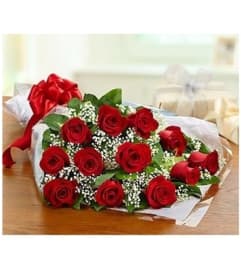 Wrapped Red Rose Bouquet. An arrangement by Anderson Flowers.