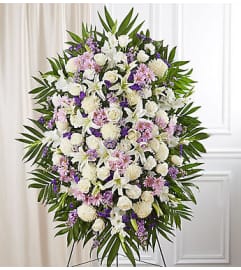Standing Spray Lavender and White Sympathy. An arrangement by Elegant Florist.
