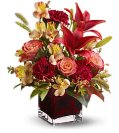 Teleflora Indian Summer Arrangement. An arrangement by Jimmy's Flower Shop.