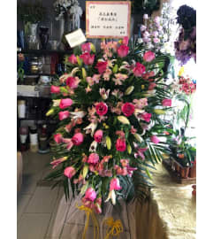 Grand 2641. An arrangement by Flamingo Floral and Gifts.