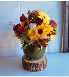 Rounding Fall. An arrangement by Kelly Ann's Floral.