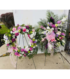 Matching pink passion sympathy wreath and spray. An arrangement by Kelly Ann's Floral.