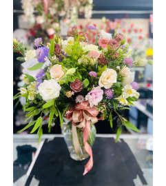 Romantic Mix. An arrangement by Geni's Florist and Gifts.