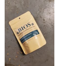 BIOS All Natural Plant Fertilizer. An arrangement by The Bloom Room Floral Company.