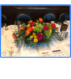 Upscale Fall Centerpiece. An arrangement by Renton Flower Shop.