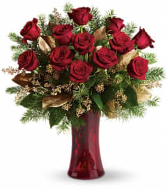 Christmas dozen. An arrangement by Big Event Floral and Decorating Co.. Christmas dozen. An arrangement by Big Event Floral and Decorating Co..